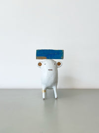 White with Blue Hat and Rawhide