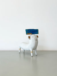 White with Blue Hat and Rawhide