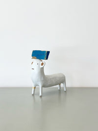 White with Blue Hat and Rawhide