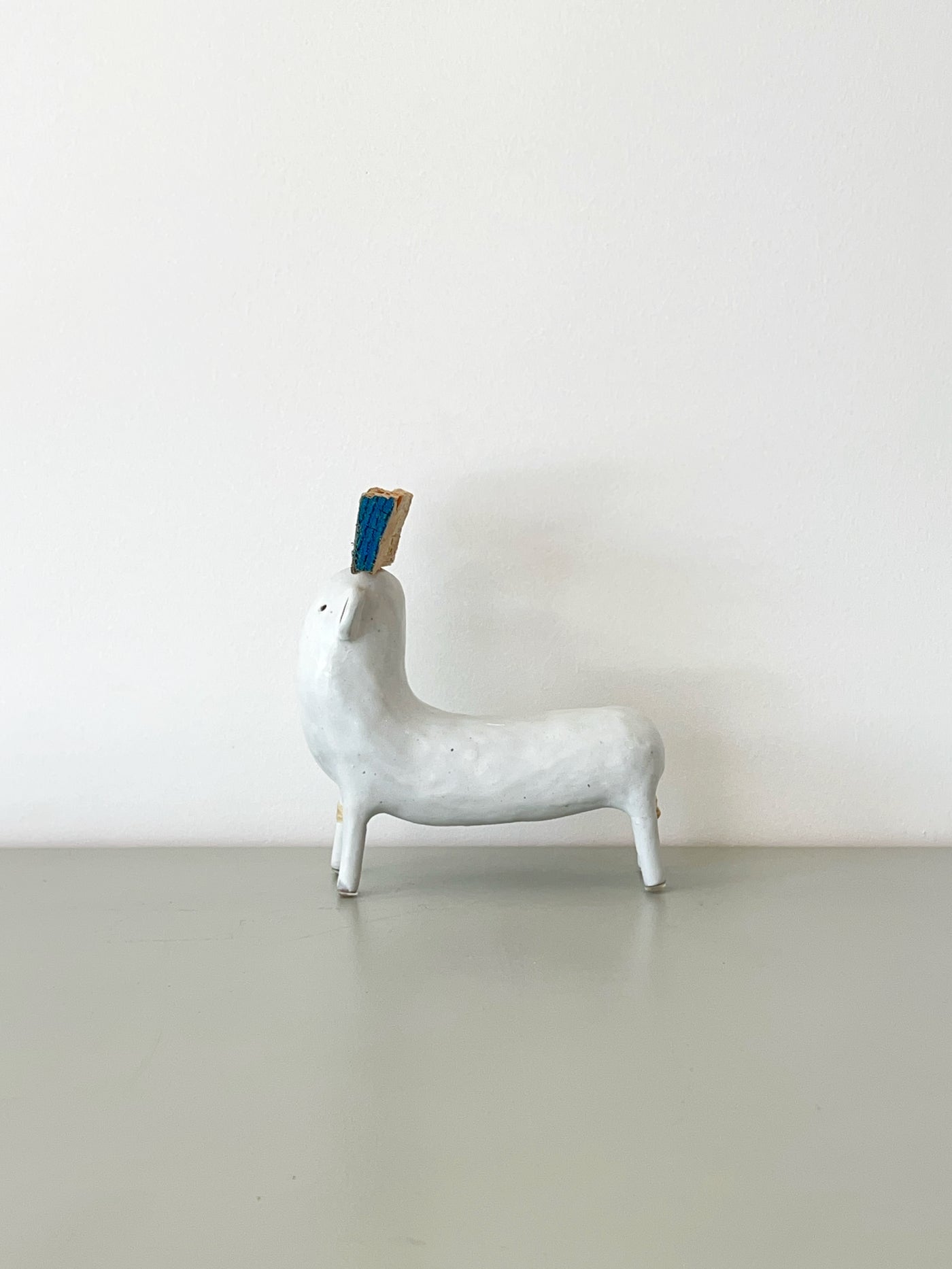 White with Blue Hat and Rawhide