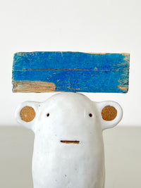 White with Blue Hat and Rawhide